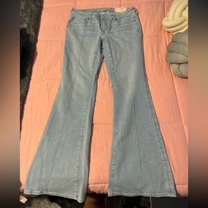 Brand new with tags American Eagle flare jeans. Size 8 long and they stretch.